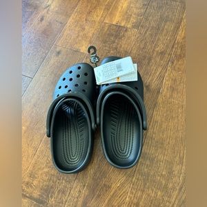 Black classic crocs. Size W6, M8, new